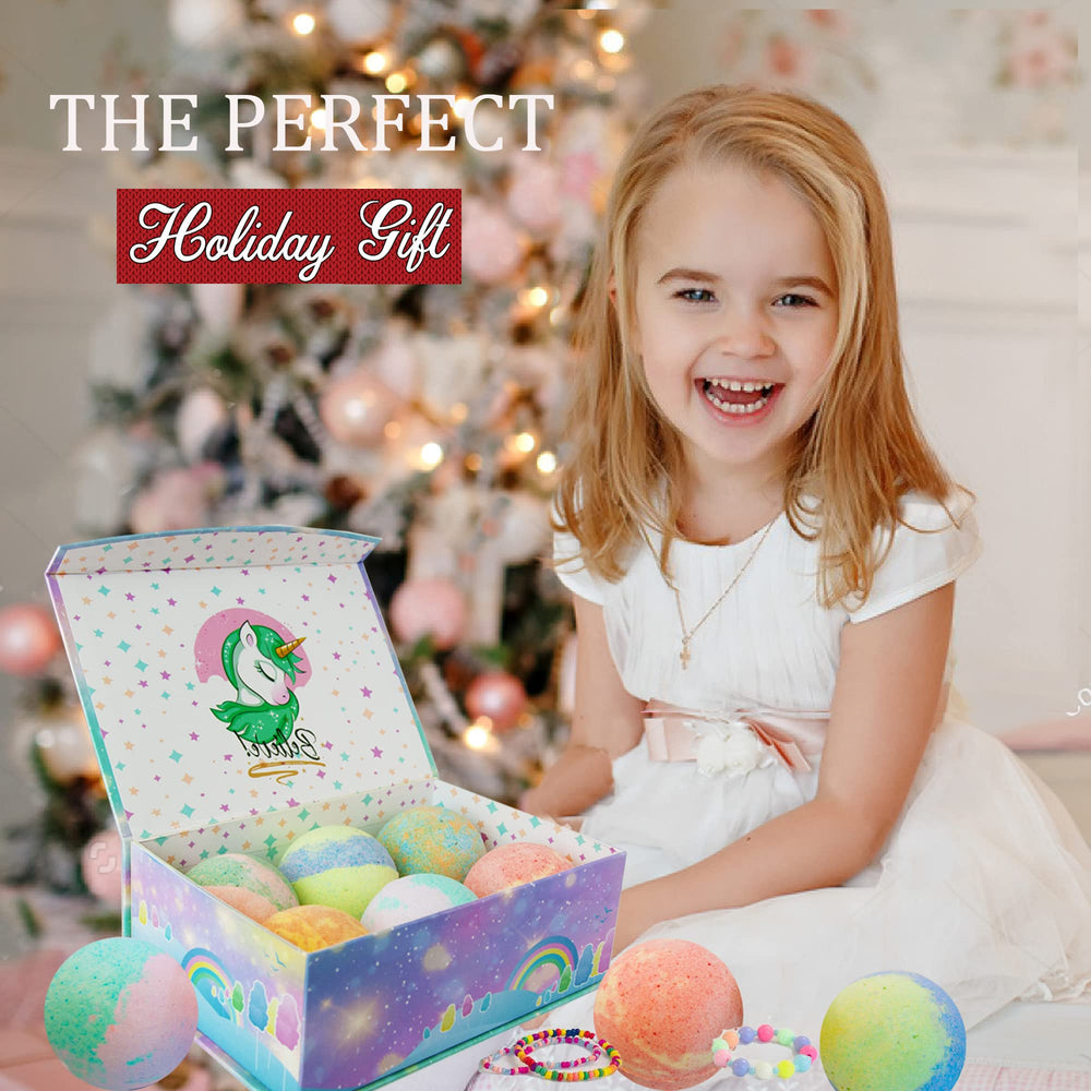 Mineral Me California unicorn bath bombs inside jewelry box reveal surprise bracelets for kids' gifts.