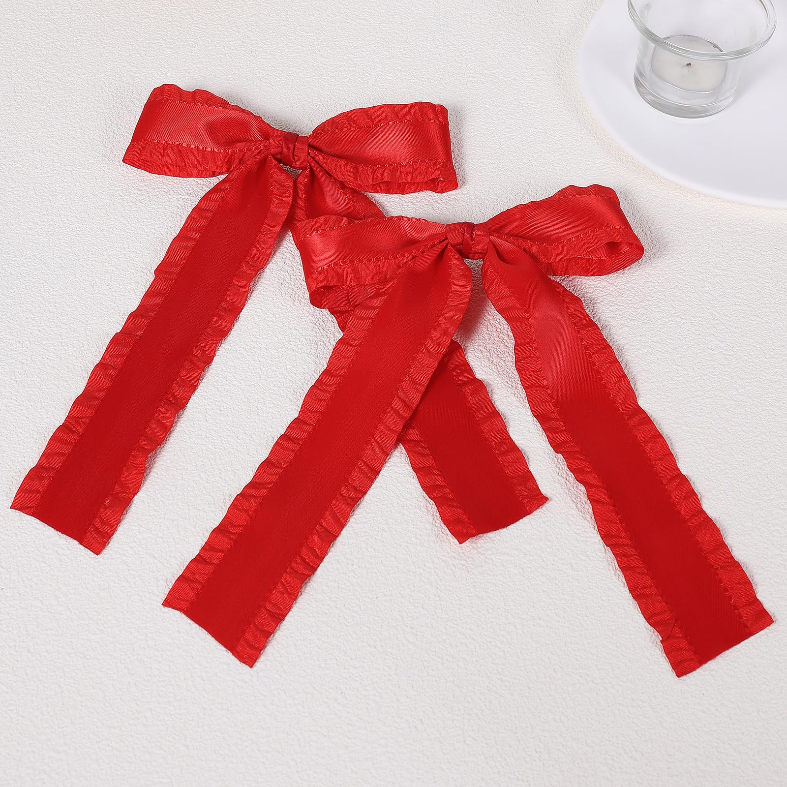 Miroksh red satin bow clip close-up showing double ruffle edge detail
