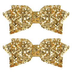 Miroksh glitter Christmas gold bow clip adds festive shine to holiday hairstyles.