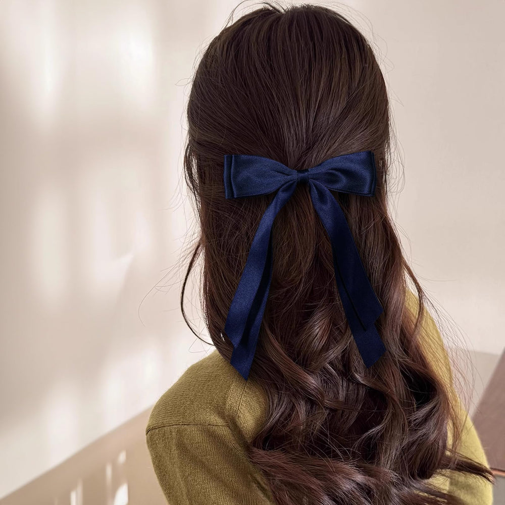 Miroksh satin ribbon texture close-up emphasizes smooth finish and luxury feel.