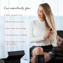 MIŠEL brush in use on wavy hair delivering gentle styling and frizz control