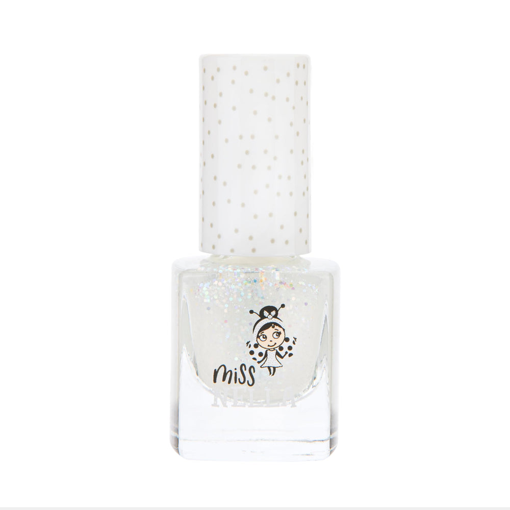 MISS NELLA Confetti Clouds child applying polish during playtime, encouraging safe imaginative nail art