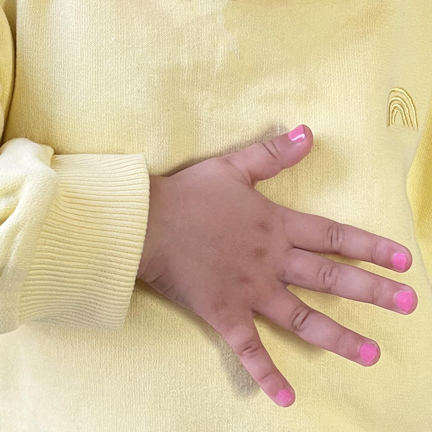 MISS NELLA Sweet Little Pack nail polish removal close-up shows easy peel-off.