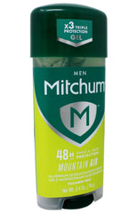 Mitchum Mountain Air gel deodorant being applied underarm for quick-dry freshness.