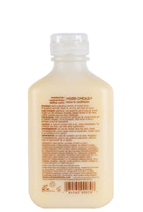 Mixed Chicks leave-in hands applying formula for smooth detangling