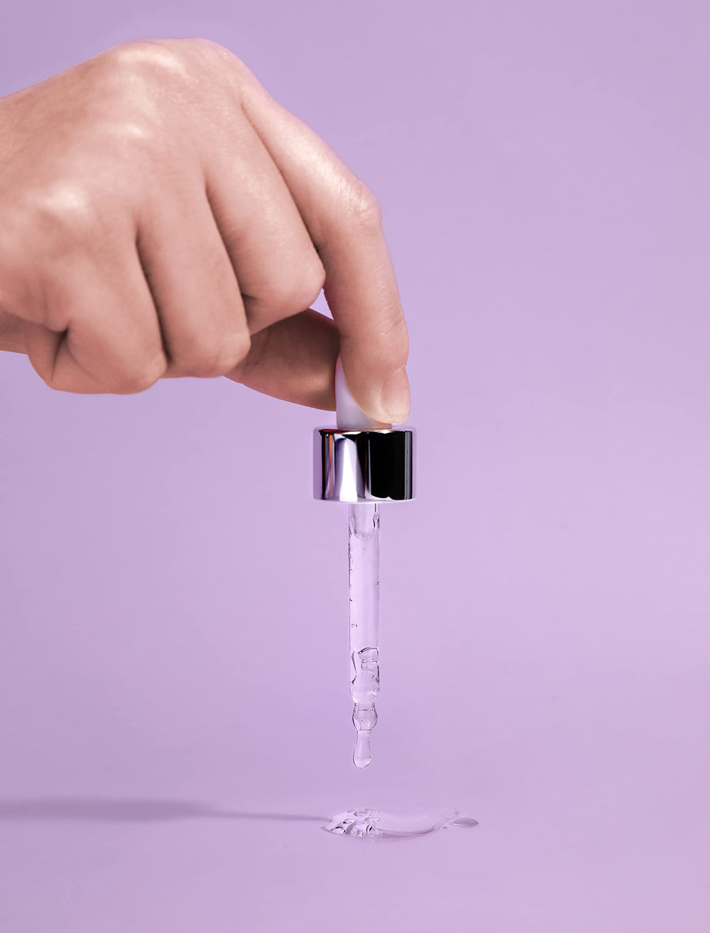 MIZON Collagen 100 ampoule closeup texture reveals hydrating, dewy serum feel.