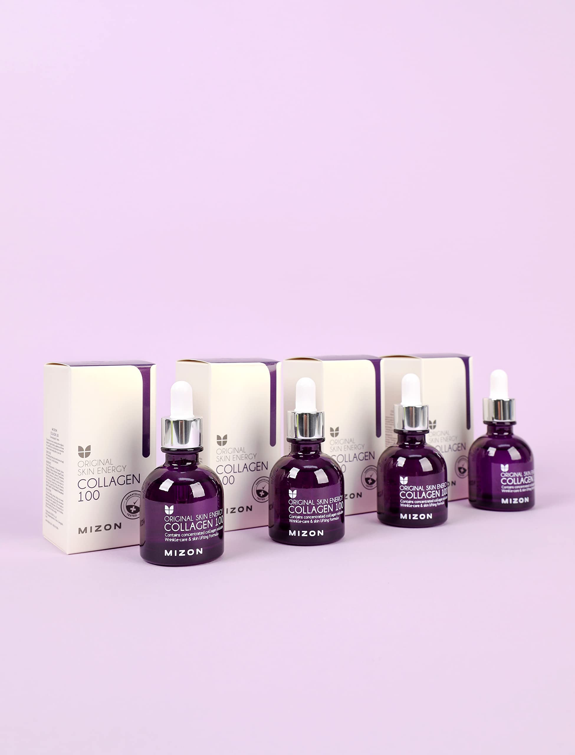 MIZON Collagen 100 ampoule face application demonstrates smooth absorption for refreshed skin.