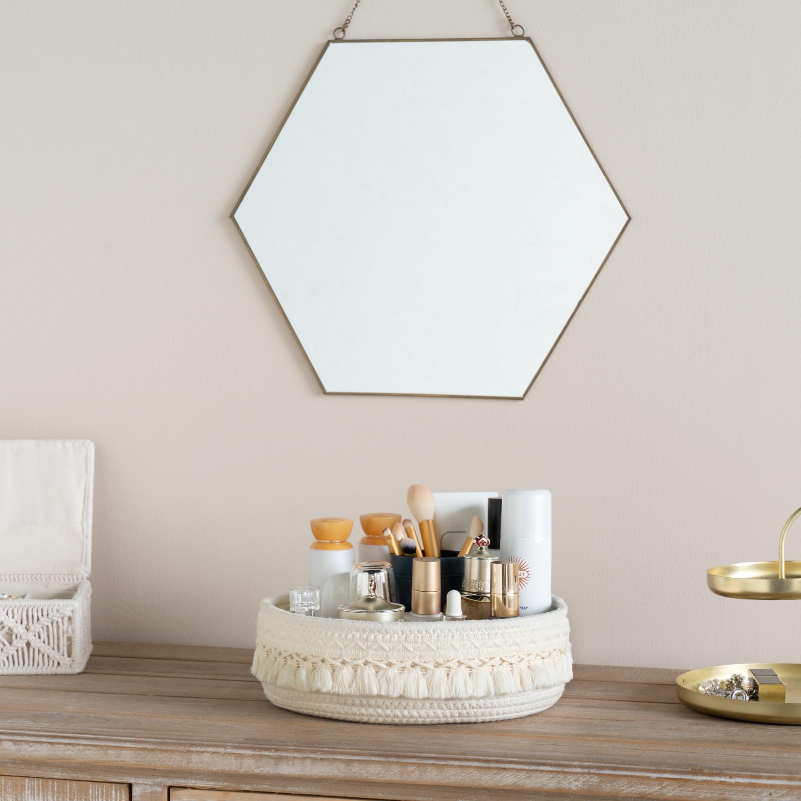 Mkono macrame basket with tassels adds boho charm to dresser storage.