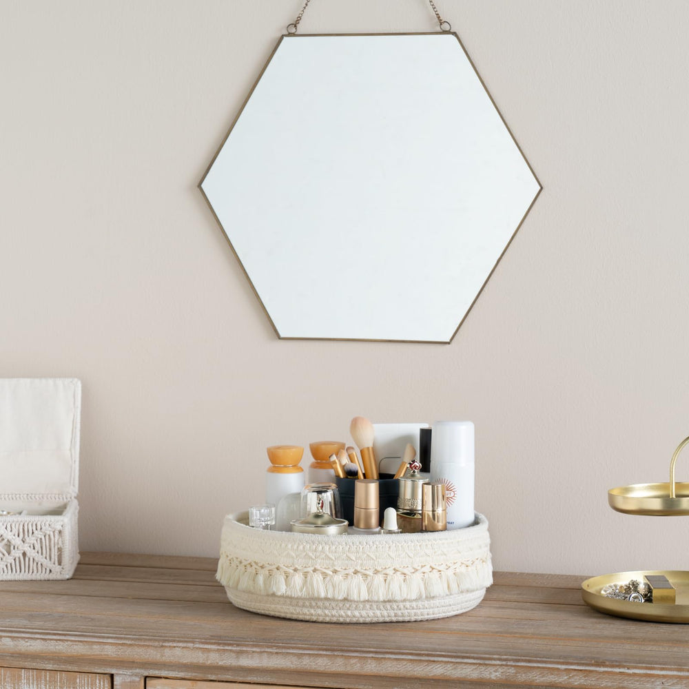 Mkono macrame basket with tassels adds boho charm to dresser storage.