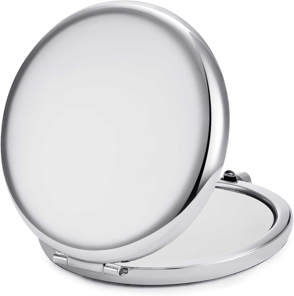 MLLXX compact mirror 2x side helps detailed makeup application and lash checks.