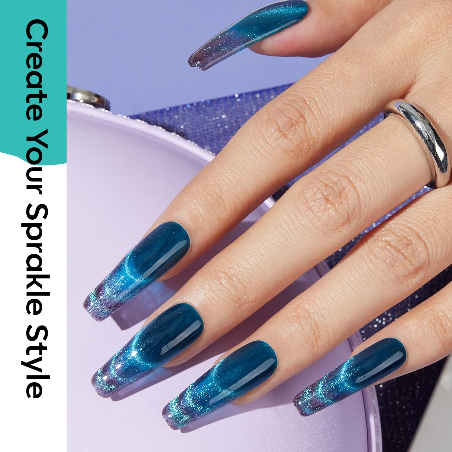 Modelones galactic glitter nails with shimmering holographic finish.