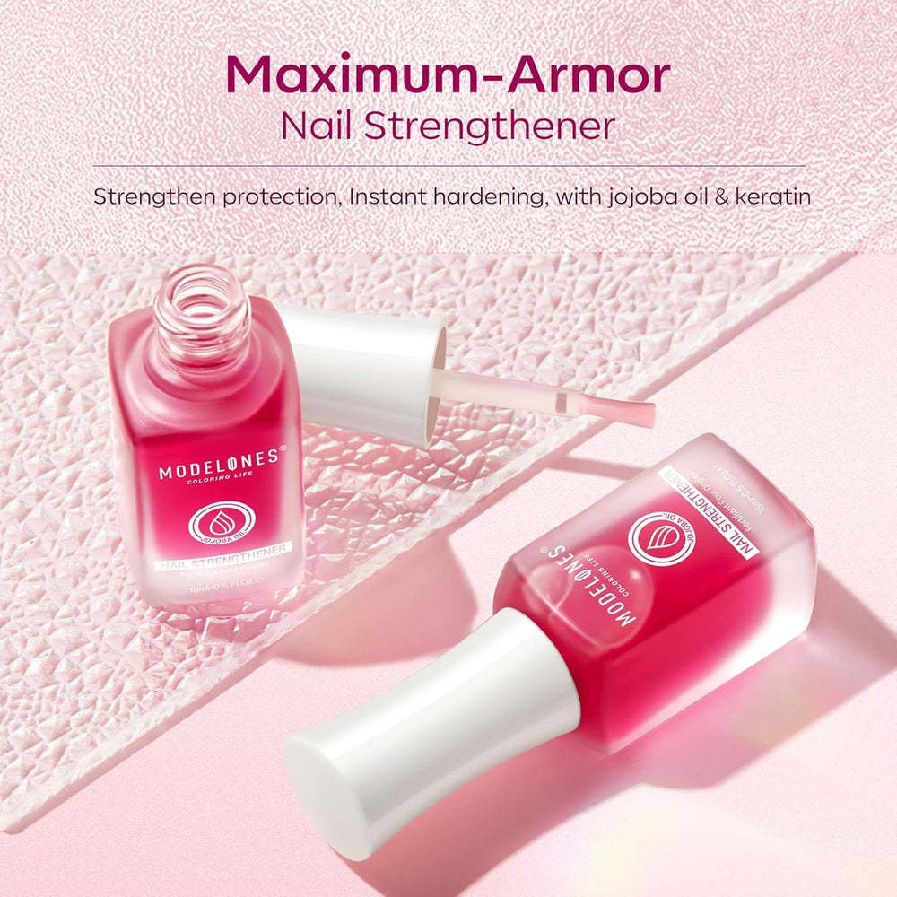 Modelones nail-strengthener base coat application for smooth color start.