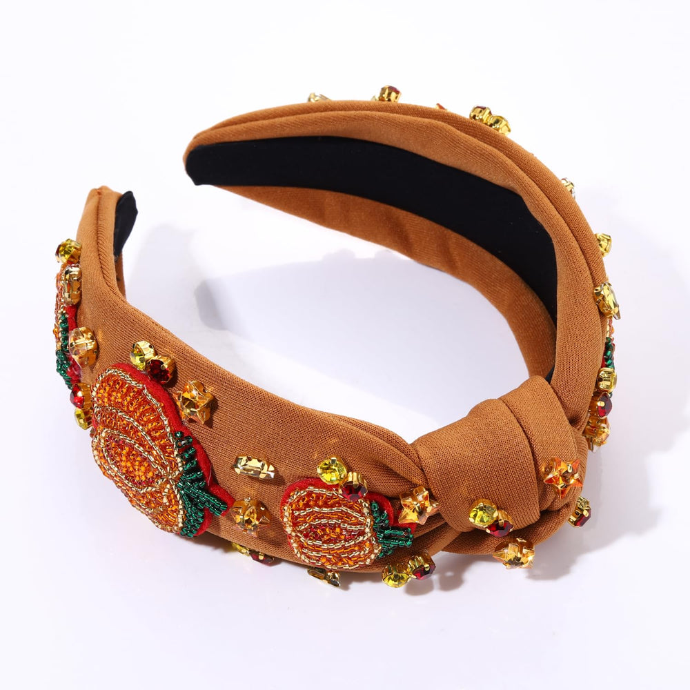 Mokkia headband black knot holds hair comfortably.