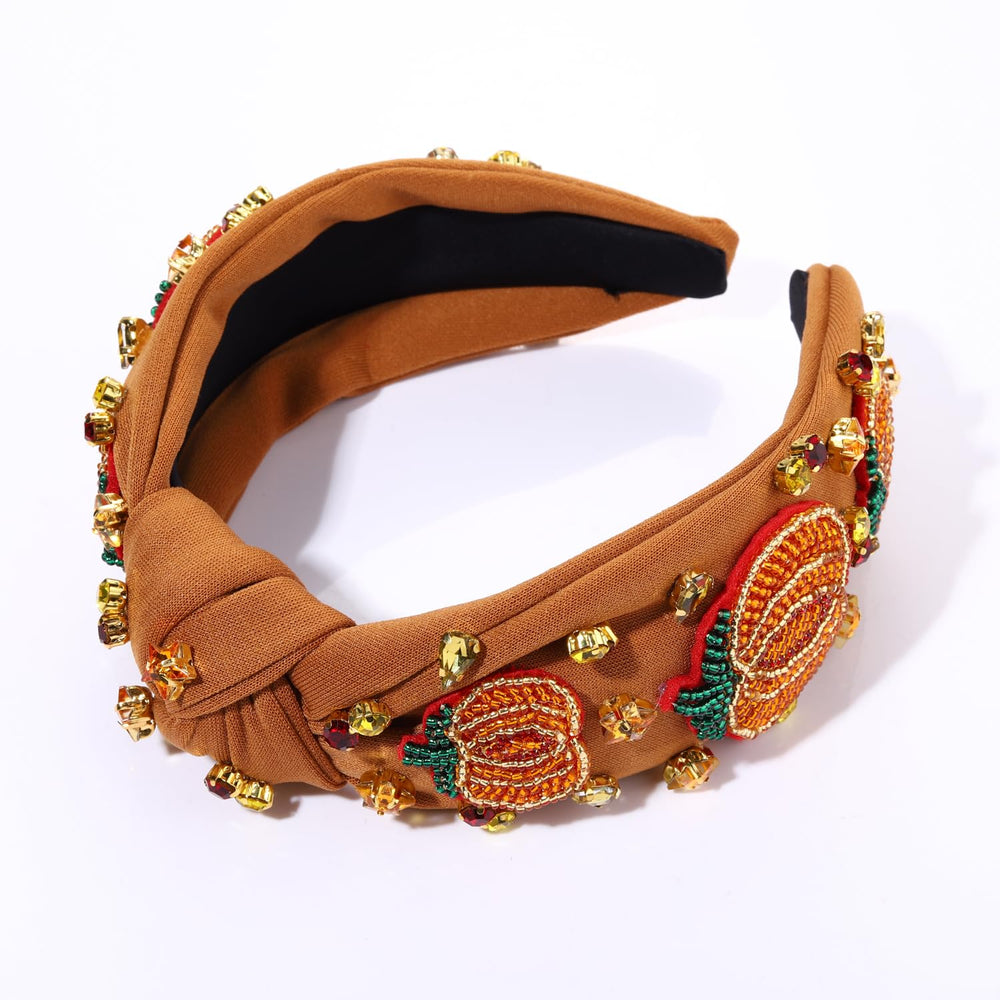 Mokkia headband maple leaf detail adds autumn charm.