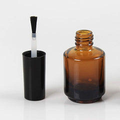 Mollensiuer empty nail polish bottle with brush-cap closeup for precision application