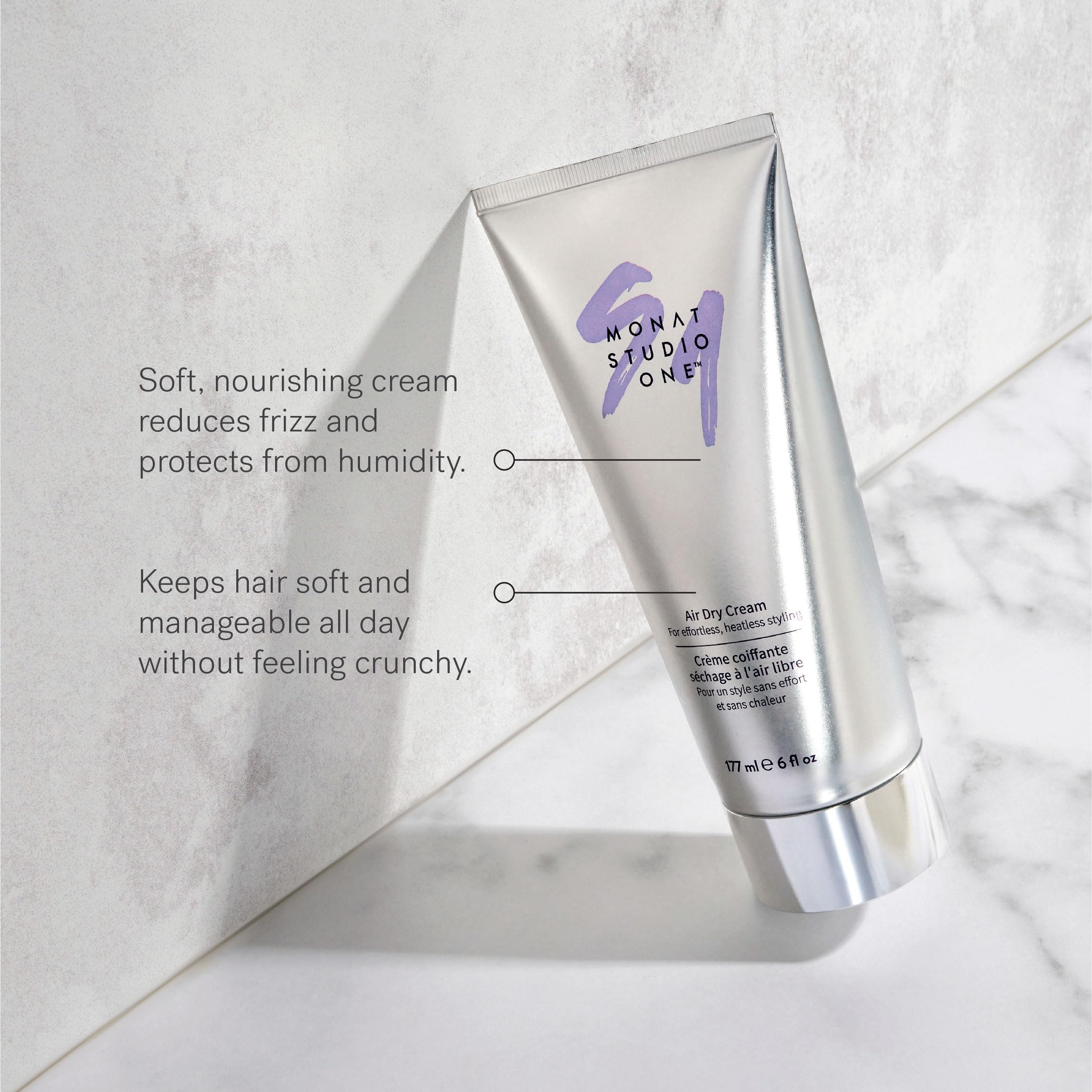 MONAT STUDIO ONE Air Dry Cream hands applying demonstrates non-greasy application.
