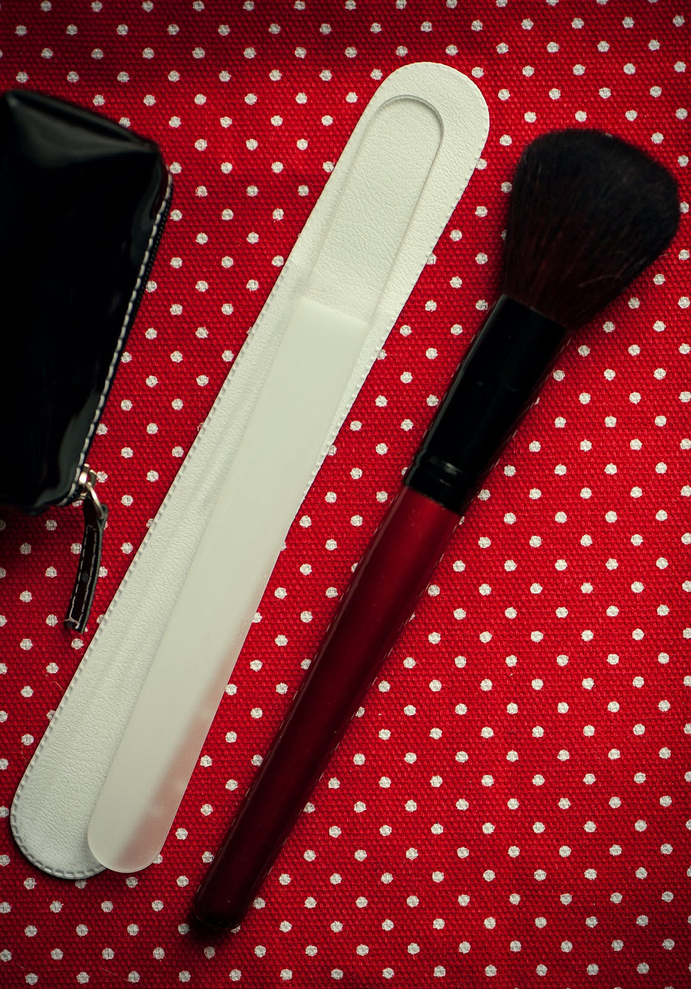 Mont Bleu nail file with protective pouch shown for travel-ready grooming.