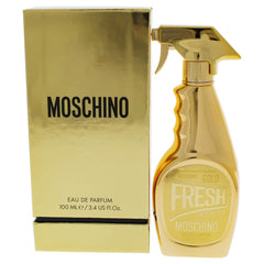 Moschino Gold Fresh Couture bottle close-up—sparkling elegance for date nights.