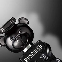 Moschino Toy Boy campaign image features bold bear branding and confident masculine vibe