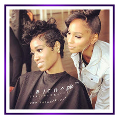 Motions Motons Regular Hair Relaxer applied to hair strands for even smoothing.