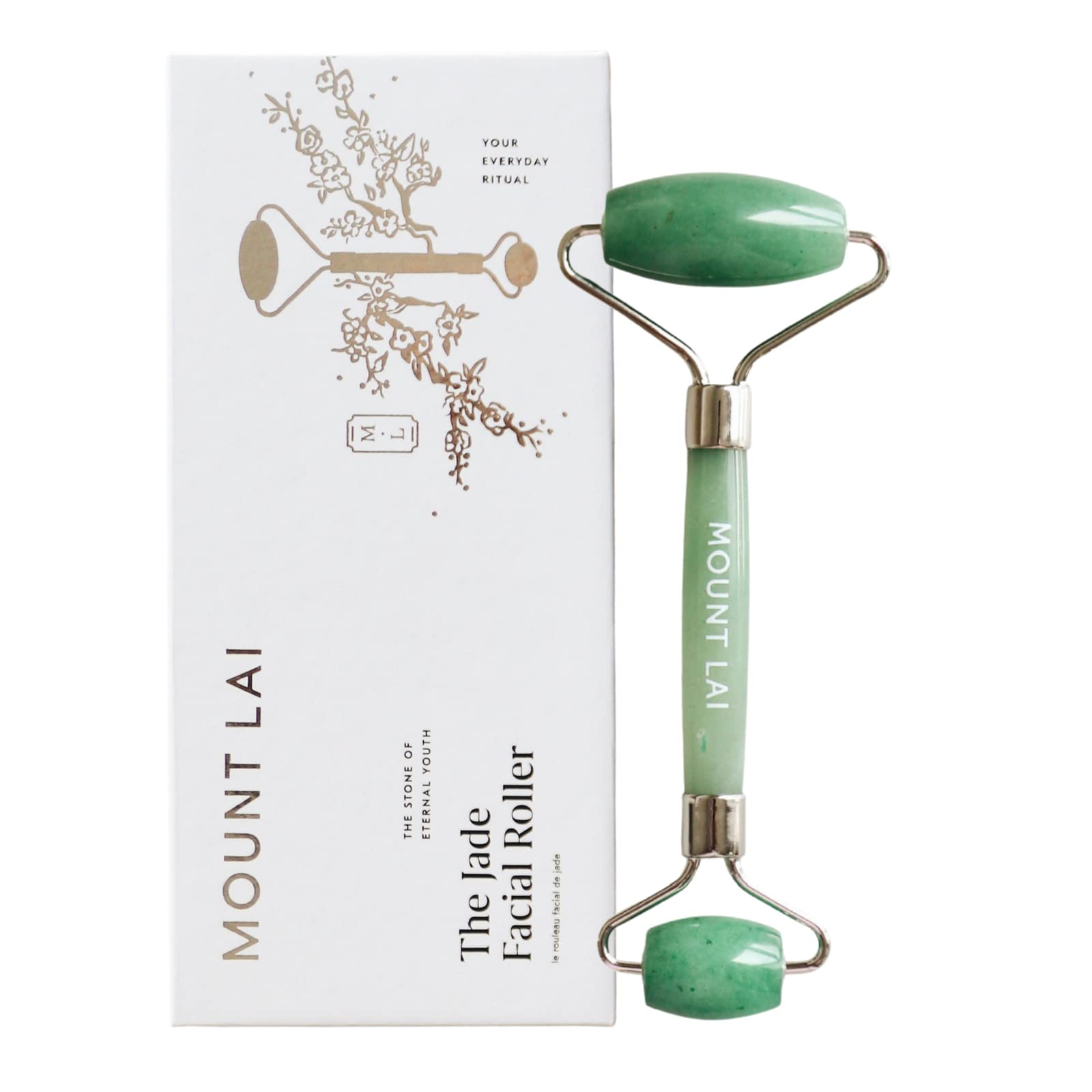Mount Lai De-Puffing Jade Roller in hand for soothing self-care.