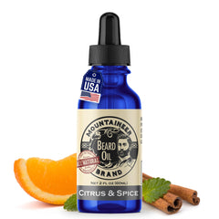 Mountaineer Brand natural beard oil bottle with citrus and spice scent for daily hydration.