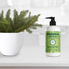 Non-greasy texture of Mrs. Meyer's Iowa Pine hand lotion on hands.