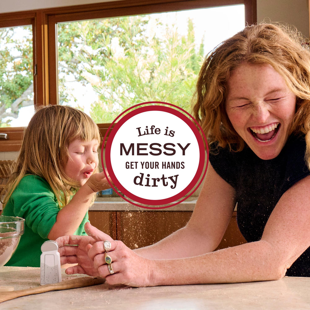Family washing hands with Mrs. Meyer's soap demonstrating gentle formula for everyday use