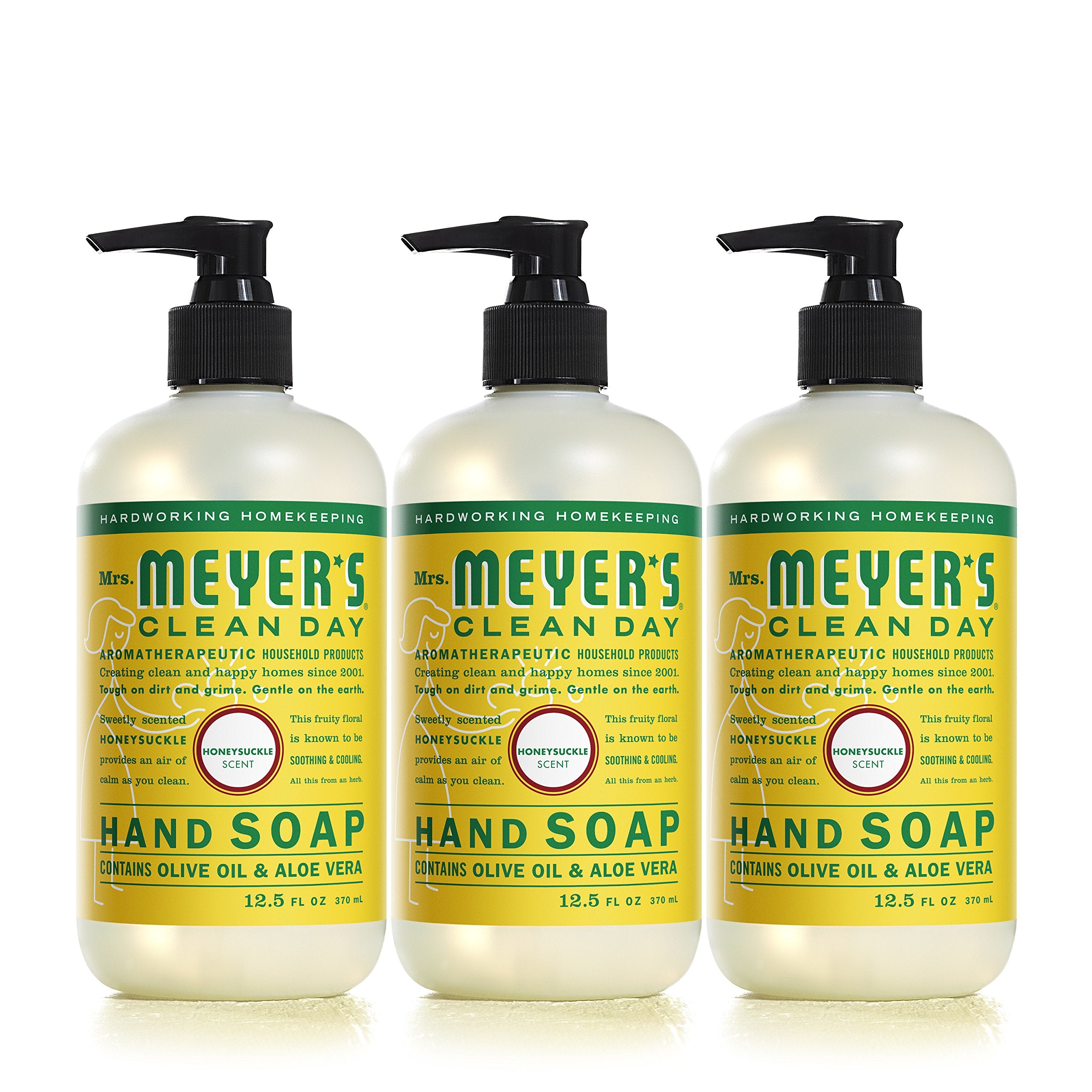 Mrs. Meyer's hand soap bottle pour with honeysuckle scent for refreshing hand washing.