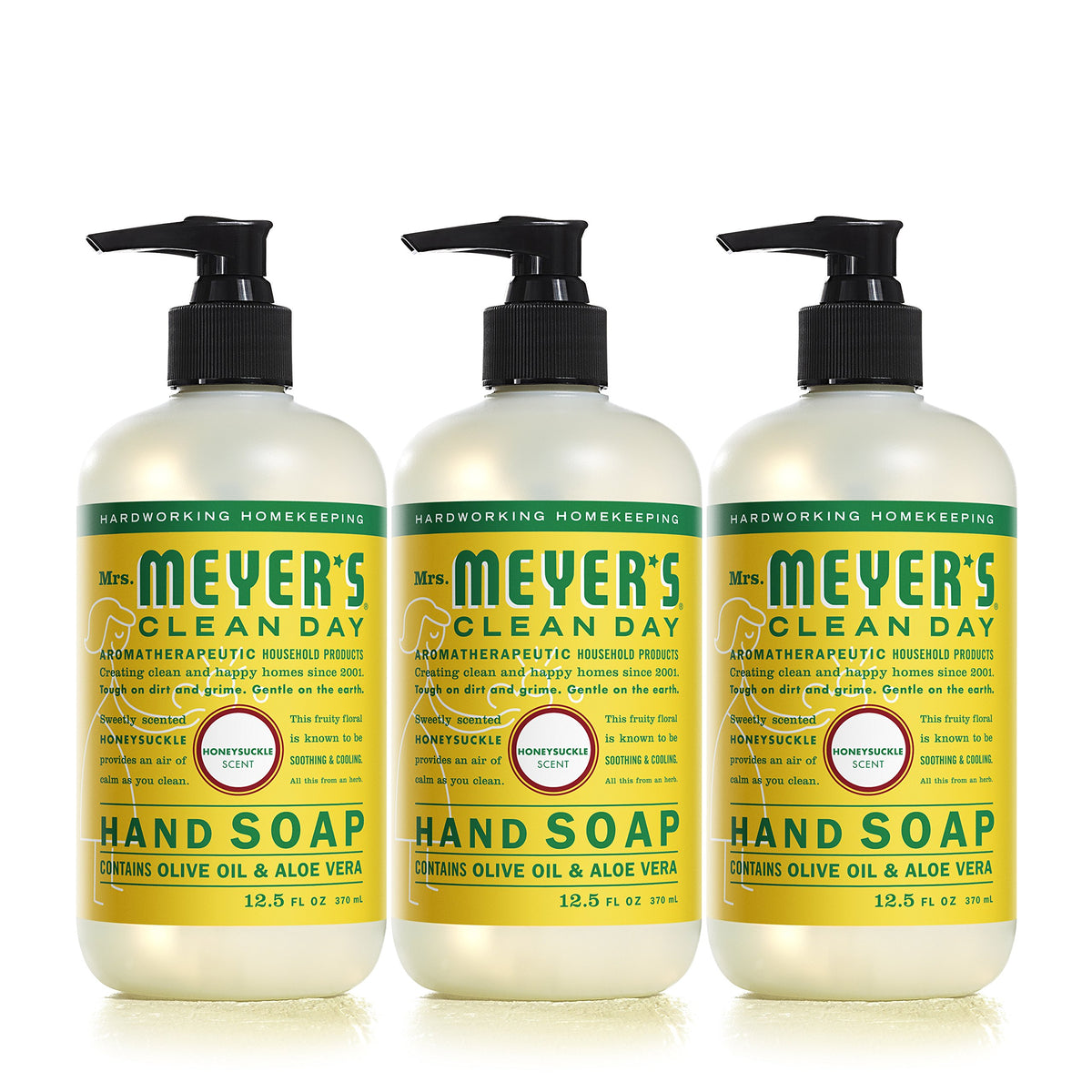 Mrs. Meyer's hand soap bottle pour with honeysuckle scent for refreshing hand washing.