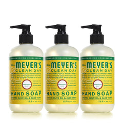 Mrs. Meyer's hand soap bottle pour with honeysuckle scent for refreshing hand washing.