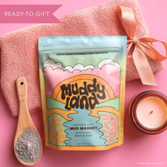Muddyland Full-Body Mud Mask Application demonstrates versatile detox for face and body.