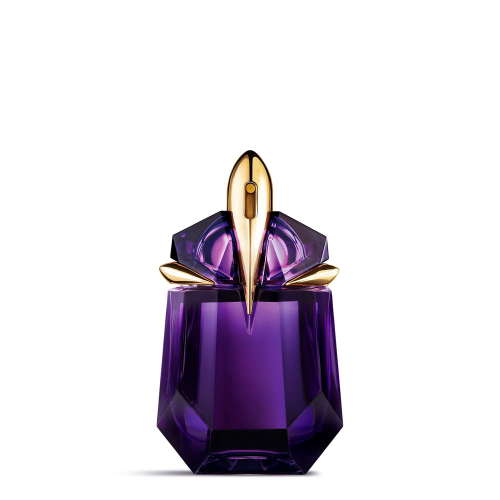 MUGLER Alien bottle on dresser highlighting luxurious design and daily scent ritual