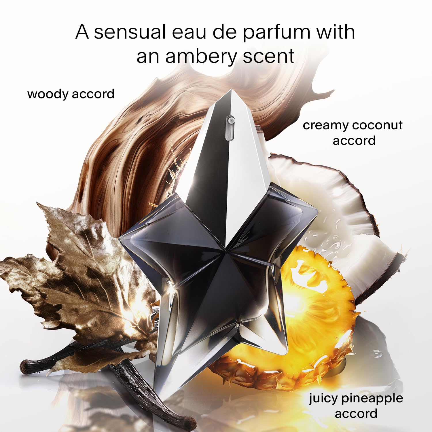 Mugler Angel Fantasm spray application captures mist for easy wear and immediate aura