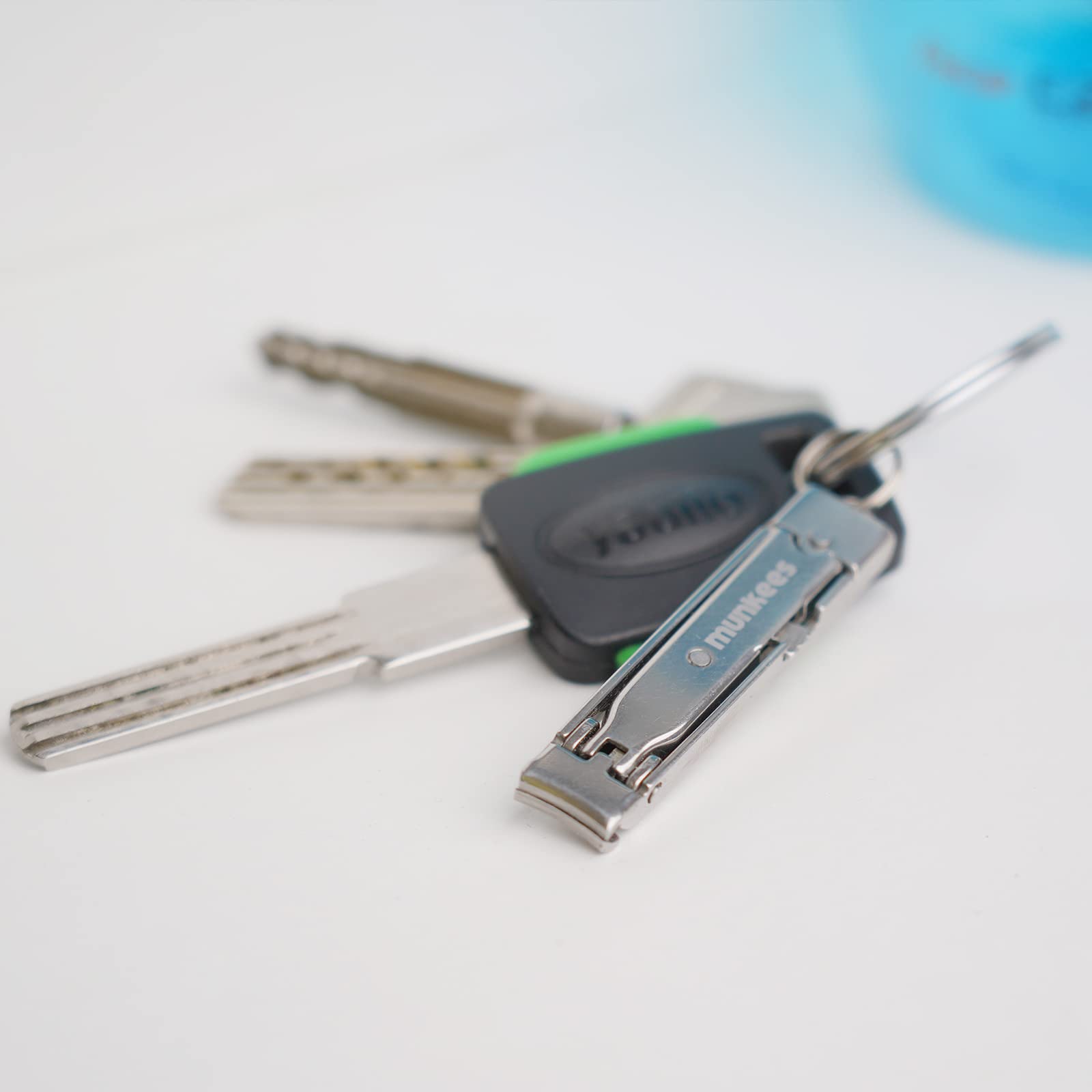 Munkees Ultra-Thin Nail Clippers Keychain ideal for travel and camping scenarios.