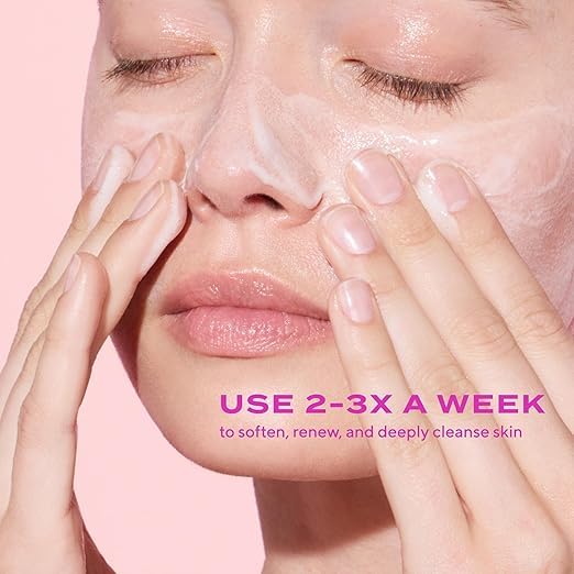 Murad exfoliating cleanser texture closeup reveals smooth cream for daily polishing.