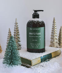Muse Apothecary Hand Ritual warm cedar packaging highlighting gift-ready presentation