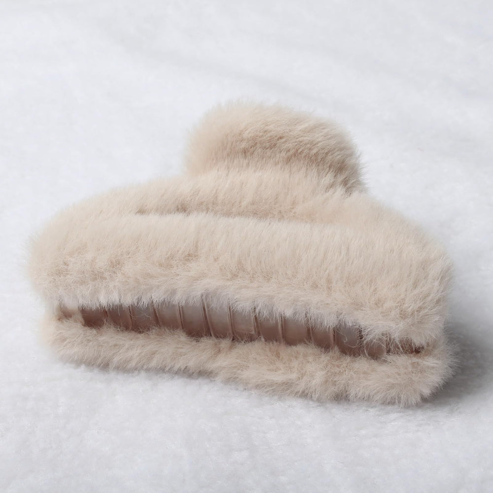 Naibirdr fluffy hair clip halfup-ready holds thick or thin hair for easy styling.
