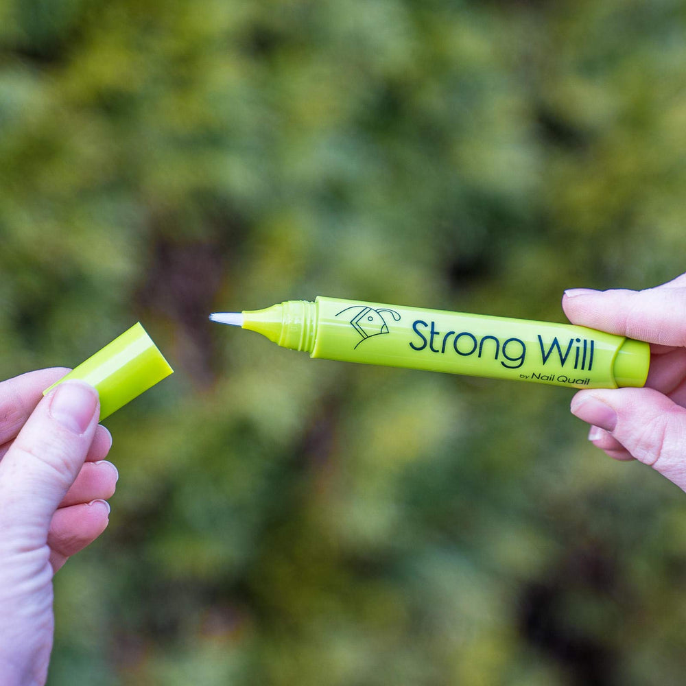 Nail Quail Strong Will click pen in use shows quick one-handed application.