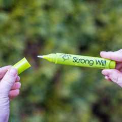 Nail Quail Strong Will click pen in use shows quick one-handed application.