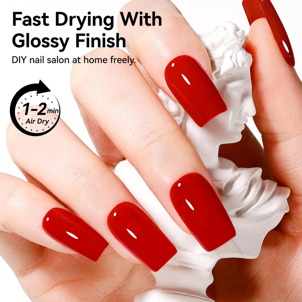 Nailshion red nail polish on nail with glossy finish for chic look.