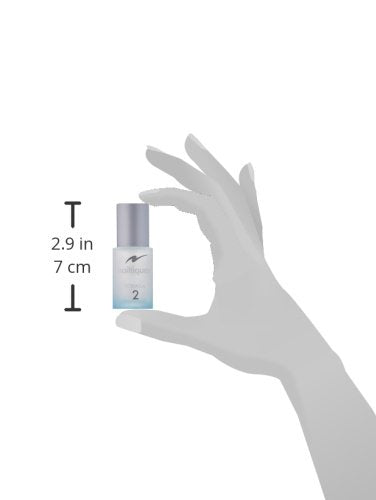 Nailtiques Formula 2 on vanity shelf illustrates portable nail-strength solution.