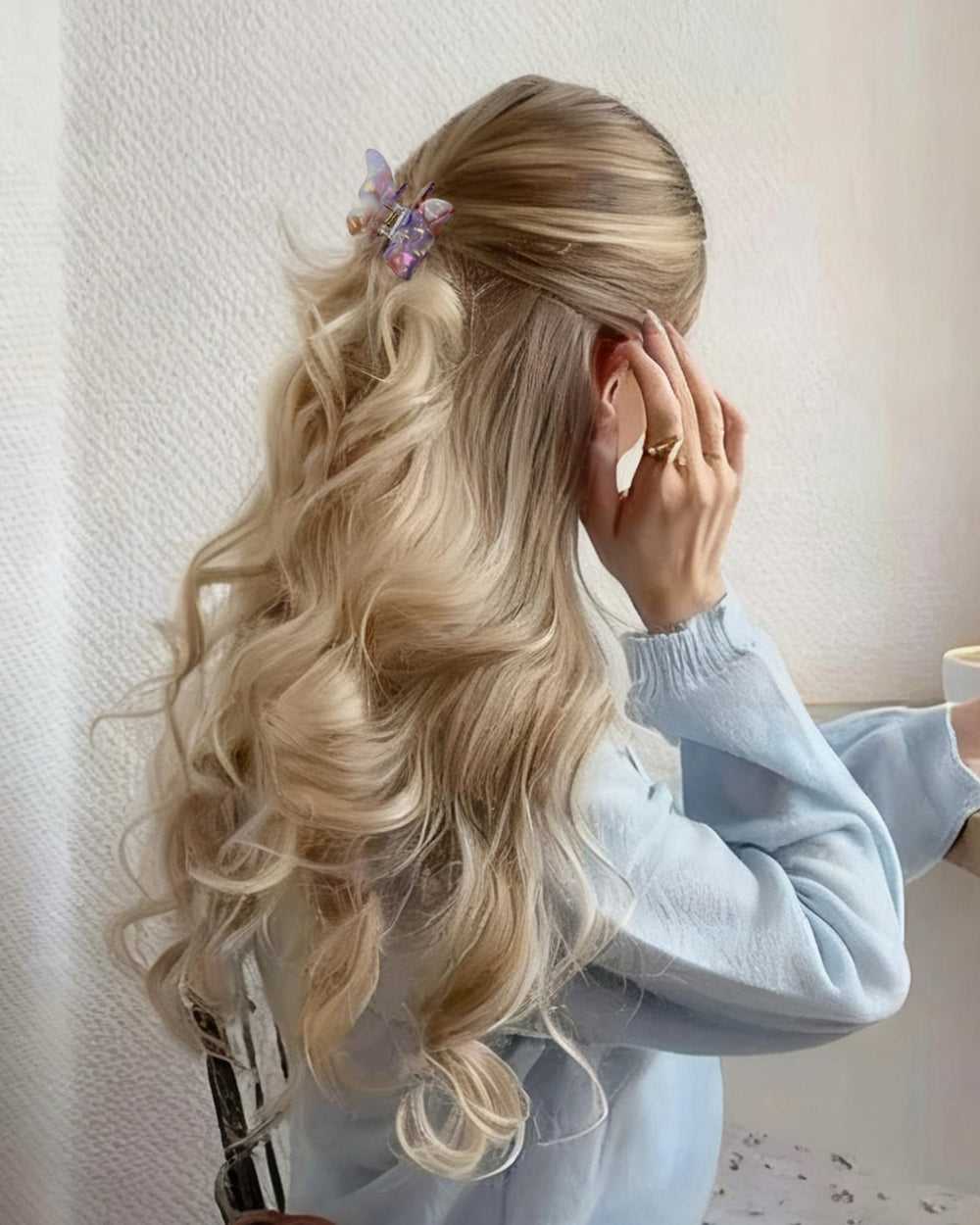 NAISIER butterfly hair clips during styling—smooth action on curling.