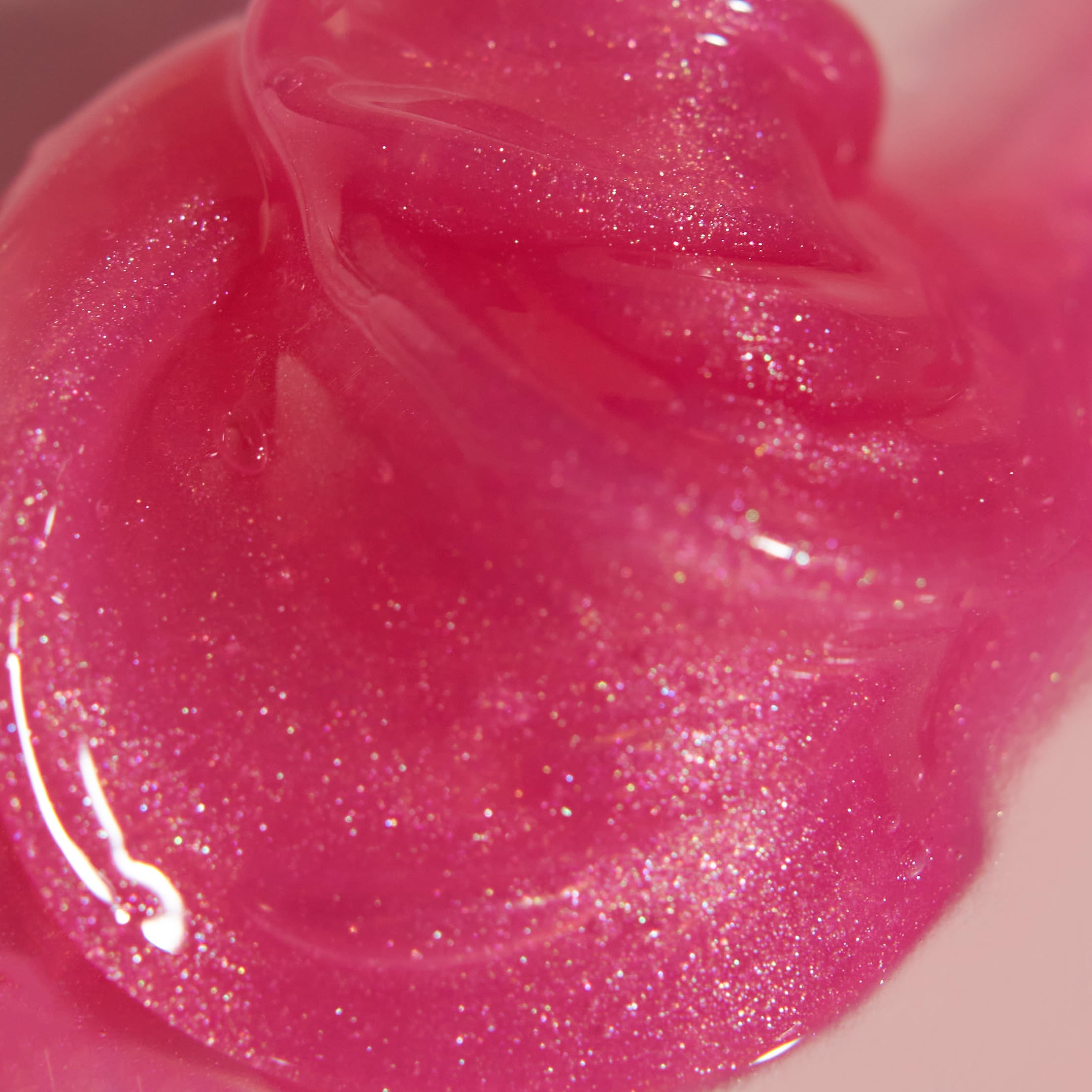 Naked Sundays PoutScreen lips with a high-gloss finish for enhanced shine.
