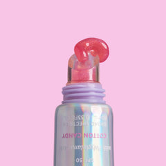 Naked Sundays PoutScreen lip application close-up highlights glossy finish.