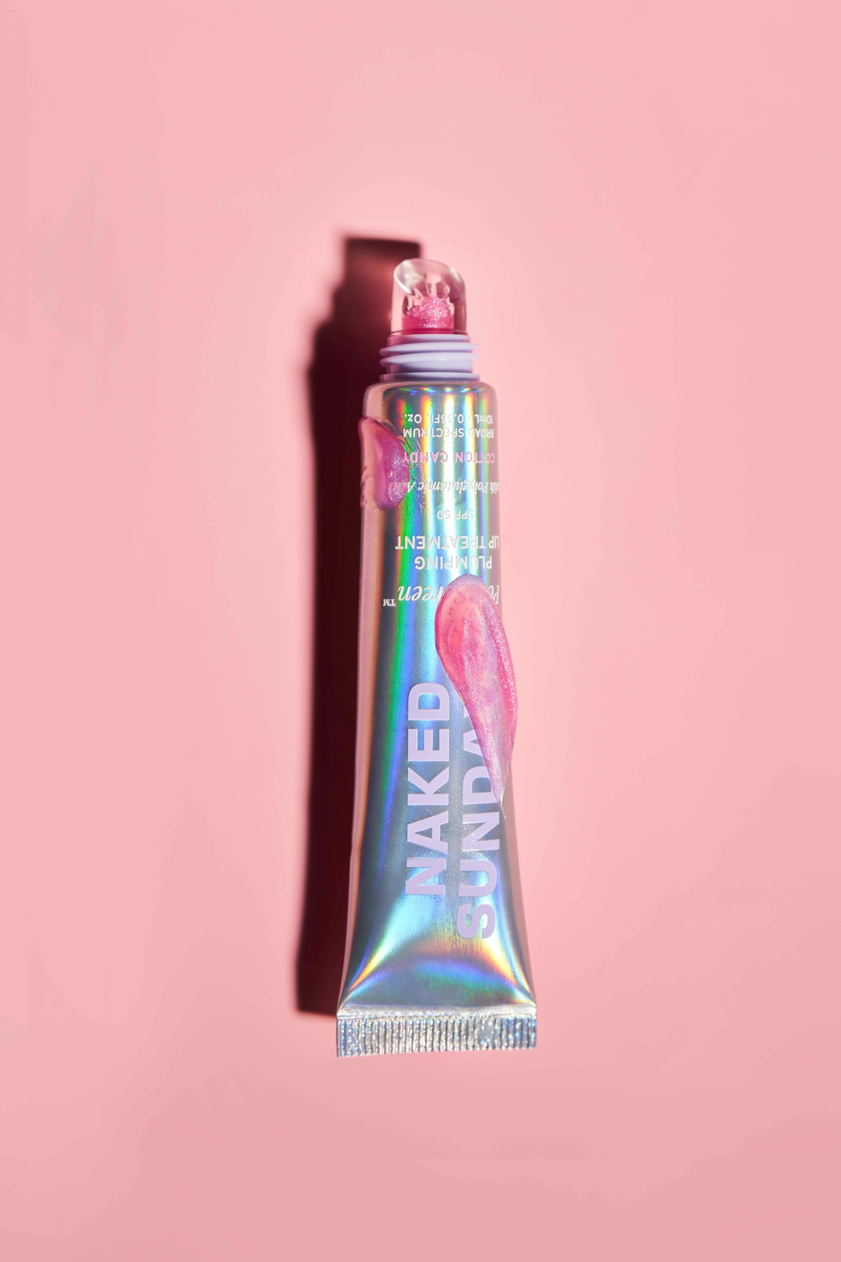 Naked Sundays PoutScreen sheer tint provides color with a glossy look.