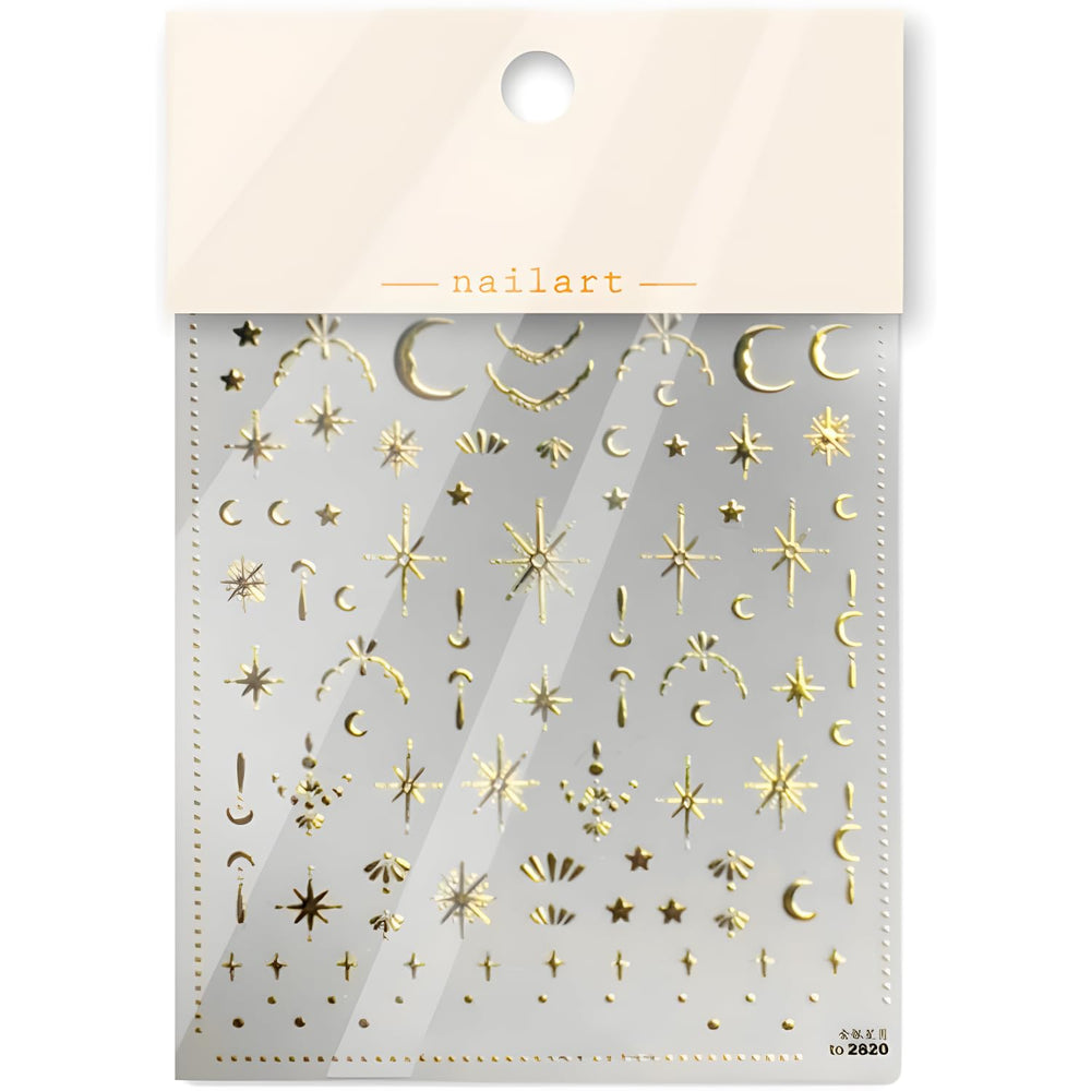 Namrec luxury gold nail stickers next to a manicure kit for home use.