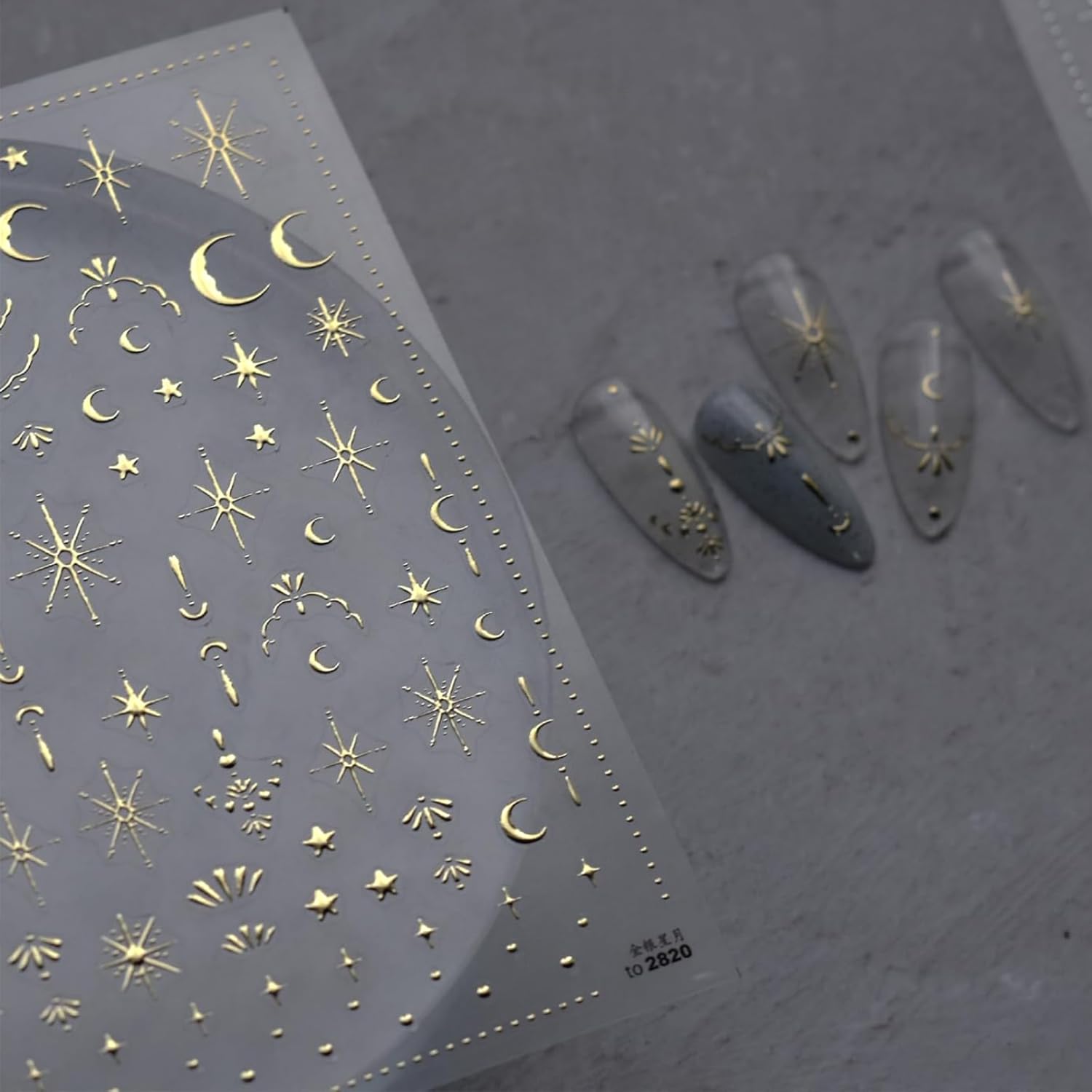 Namrec luxury moon star nail stickers close-up in gold for dazzling gel polish accents.