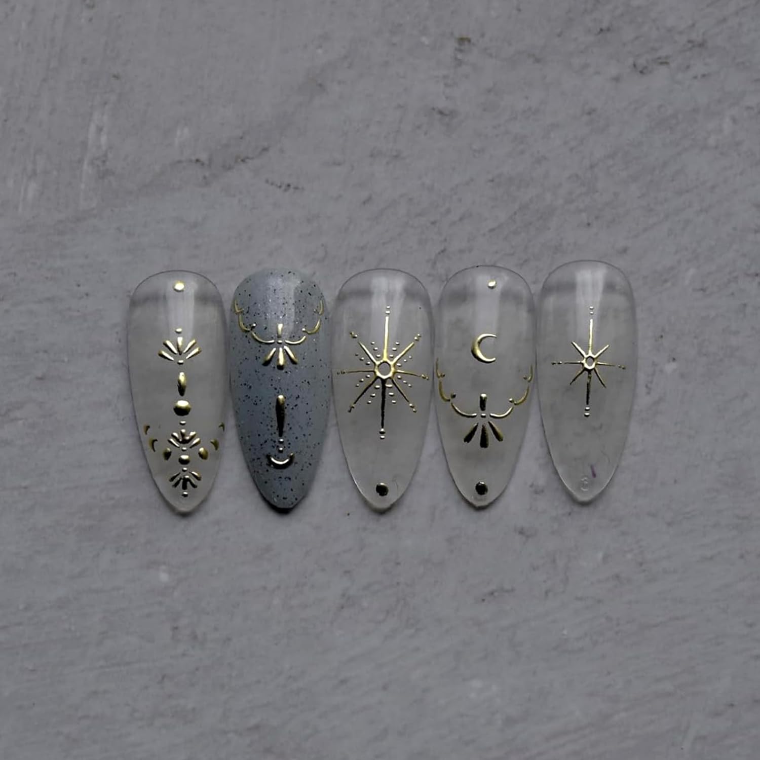 Namrec moon star nail stickers applied on nails show easy DIY application.