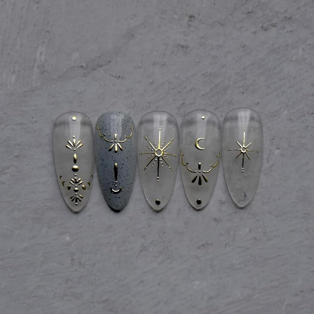 Namrec moon star nail stickers applied on nails show easy DIY application.